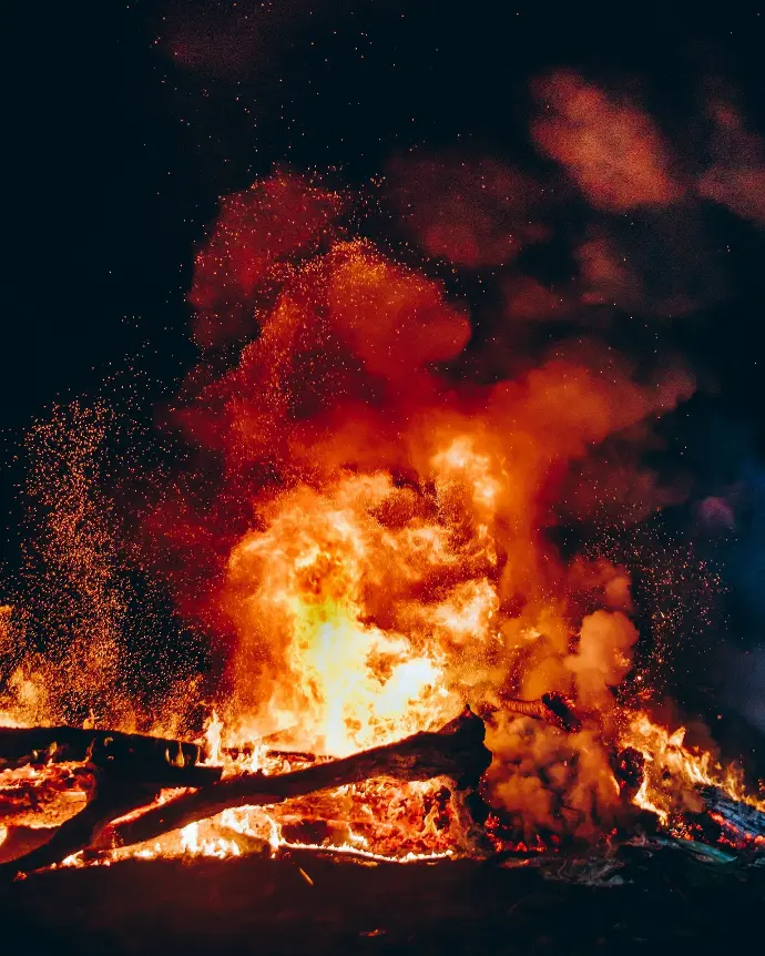 fire with black smoke during night